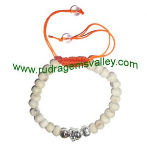 Adjustable beaded free size 7mm original tulsi beads bracelets, made of 7mm tulsi 24 beads and 3 budhha metal beads in thread as per picture. Pack of 1 piece, also available in custom designs and sizes as per your instructions.