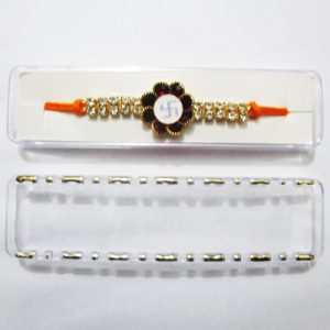 Fancy rakhi with metal decorated Swastik and AD for Indian festival Rakshabandhan celebration, pack of 1 pcs. as per picture.