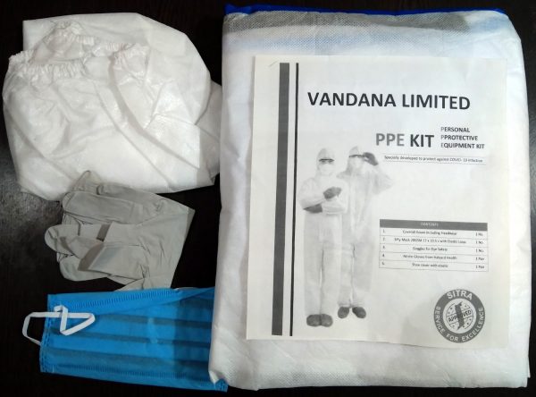 Personal protective equipment kit or PPE Kit specially developed to protect against COVID-19 infection. It includes coverall gown and headwear, 3 ply mask, goggles, nitrile gloves and shoe cover with elastic. Pack of 10 Sets